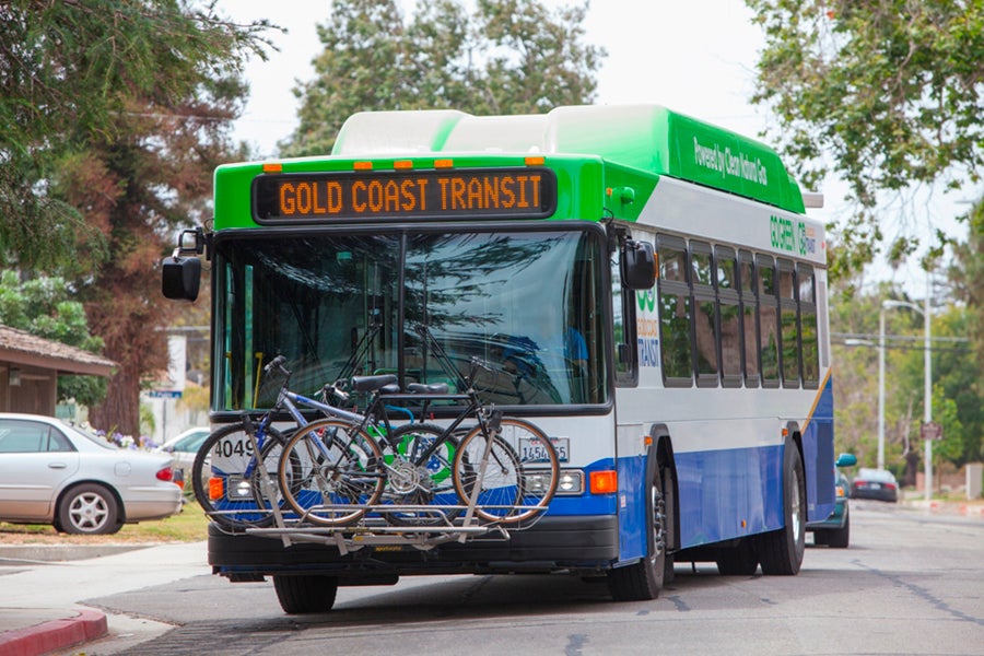 bus driving with bikes in the rack