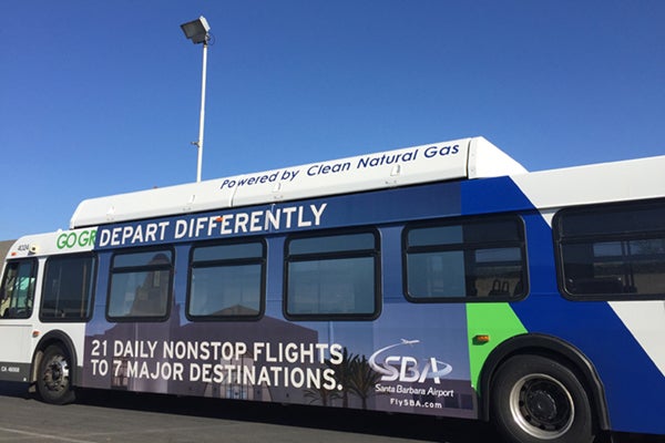 bus with ad on side of bus