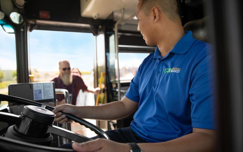 driver welcoming a passenger